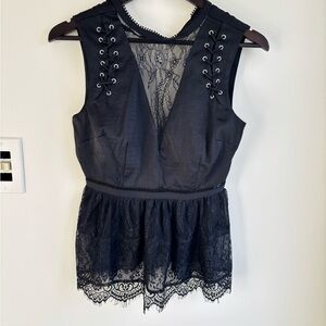 Guess Black Peplum Top with Lace and Grommet details Size XS